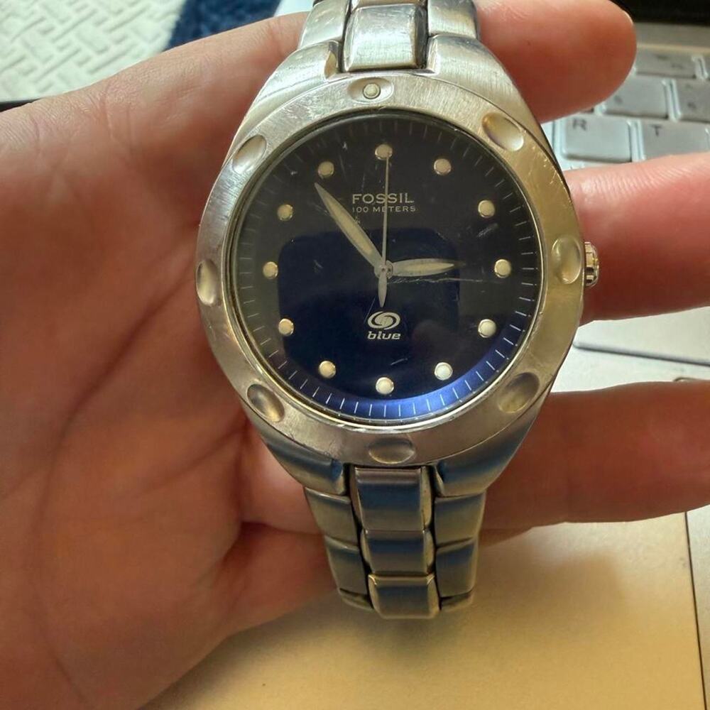 Fossil blue dial watch with silver band